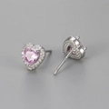 Macro detail of S925 sterling silver heart studs with pink center and zircon pavé - Pink