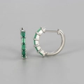 Close-up of silver hoop earrings featuring emerald green rectangular zircon gemstones - Silver/Green Zirconia