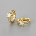 Macro view of gold-plated star hoop earrings with white enamel and clear zircons - Copper / Gold White