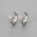 Close-up of silver star earrings with pink enamel inlay and sparkling zircon stones - Copper / Silver Pink