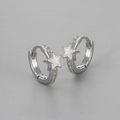Macro detail of silver star hoop earrings with white enamel and sparkling zircon pave - Copper / Silver White