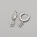 Elegant silver letter E hoop earrings with sparkling micro pavé cubic zirconia - Silver / E