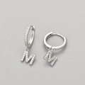 Silver letter M huggie hoop earrings with sparkling cubic zirconia pavé setting - Silver / M