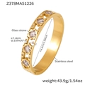 Close-up of gold stainless steel cuff bangle with marquise crystals and star cutouts - Gold White Glass Star Bangle (Z378)