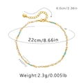 Détail d'une chevillère bohème en or avec perles blanches, perles turquoise et dimensions - Or 18 carats / Style Perle Artificielle et Perle Bleu Canard (KA0230)