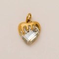 Detailed close-up of a melting gold design on a heart-shaped crystal pendant - Crystal Heart Pendant
