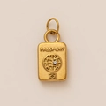 Detailed view of a gold passport charm with an engraved globe and a small crystal accent - Passport Gold