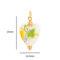 Pendentif cœur en céramique blanche avec fleurs et détails dorés, taille 23mm x 14,5mm - Cœur en Émail
