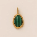 Detail of vintage gold pendant featuring a polished malachite stone with green stripes - Oval Malachite Pendant