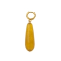 Detailed macro view of golden metal earring with long yellow translucent gemstone drop - Yellow Teardrop Style