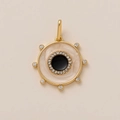 Detail of 18K gold plated sun and helm pendant with black stone and cubic zirconia - Round