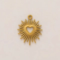 Detail of 18K gold-plated sunburst pendant with hollow heart center and textured rays - Spiky Heart