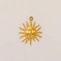 Detailed view of 18K gold plated stainless steel sun pendant with a face design - Sun