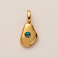 Detailed close-up of organic golden pebble pendant with an inlaid turquoise stone - Irregular Stone Pendant