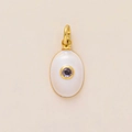 Macro detail of oval pendant with white enamel inlay and purple zircon stone - June Birthstone Pendant