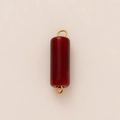 Detalle de colgante cilíndrico rojo con anillos bañados en oro de 18K para crear joyas - Colgante Cilíndrico Rojo / Estilo 26 Helado Rojo