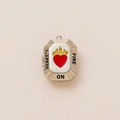 Detailed view of silver octagonal locket with Heart’s On Fire enamel motif and hinge - Letter Heart Pendant