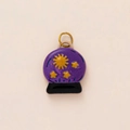 Detail of purple crystal ball charm with sun and star patterns and gold jump ring - Crystal Ball Style (No.25)
