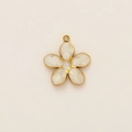Detailed close-up of a five-petal golden flower charm with white pearlescent inlay - White Cherry Blossom Pendant