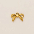 Macro detail of 18K gold plated bow pendant with smooth metallic texture and bail - Bow Pendant
