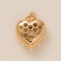 Golden heart pendant with hollow pattern and white pearls in a warm minimalist setting - Heart Pendant