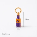 Titanium steel bottle pendant keychain with purple orange finish and clover motif - Bottle Pendant