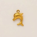 Macro shot of 18K gold plated dolphin pendant with polished stainless steel finish - Leaping Dolphin