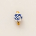 Detail of blue floral porcelain bead pendant with gold plating and 18K finish - Blue and White Porcelain