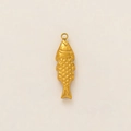 Detailed view of an antique gold fish pendant with realistic scale textures and top ring - Fish Pendant