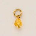 Detail of a gold-plated twisted ring pendant featuring a yellow teardrop gemstone - Yellow Irregular Pendant