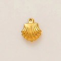 Macro detail of 18K gold plated seashell pendant showing textured stainless steel ribs - Scallop Shell