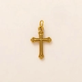 Detailed macro view of vintage gold-plated stainless steel cross pendant with scrollwork - Cross Pendant