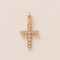 Detailed macro view of an 18K gold plated cross pendant featuring 11 sparkling clear gems - Classic Cross Style