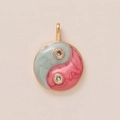 Macro detail of yin yang flower pendant with pink and green enamel and zircon stones - Blue and Pink Tai Chi Style