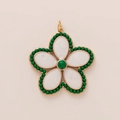 Golden camellia flower pendant featuring white petals and green zircon stone accents - Green Border Flower