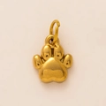 Detailed view of a polished gold-plated paw print pendant for DIY jewelry design - Bear Paw