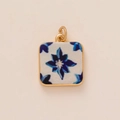 Close-up of square gold pendant with blue and white floral enamel pattern and ring clasp - Square Small Flower Pendant