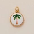 Detail of round gold-plated pendant with white enamel and tropical palm tree design - Coconut Tree Pendant