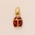 Detailed view of red enamel beetle pendant with gold metal edges and sparkling crystal stud - Beetle Shape