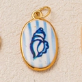 Macro detail of oval shell pendant with blue sea snail pattern on gold frame - Pendant 11 Blue Shell