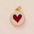 Detail of a gold-plated round pendant featuring a sparkling red glitter heart center - 17 Red Heart Pendant Only (Without Chain)