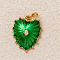Macro view of green heart pendant with sunburst texture and centered crystal detail - Green Heart