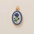 Colgante ovalado dorado con rosa azul y borde decorativo de lunares azules - Colgante de Rosa Azul