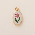 Colgante ovalado dorado vintage con estampado de flor rosa sobre base de color crema - Colgante de Flor