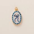 Colgante ovalado bañado en oro con lazo azul y dije blanco para creación de joyería DIY - Colgante de Lazo