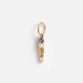 Detailed macro view of 14K gold pendant with blue zircon stones and white pearls - No. 27 Rhinestone Pendant
