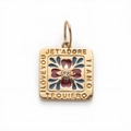 Macro detail of 14k gold square pendant with zircon flower and I Love You engravings - No. 15 Clover Pendant