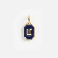 Detailed macro view of 14k gold geometric pendant with blue enamel and opal gemstone - No. 25 Blue Rhinestone Pendant
