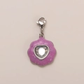 Macro detail of purple glitter pendant with heart-shaped gemstone and lobster clasp - Heart Flower Pendant Silver Tone