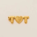 Detailed close-up of golden letter T and heart pendant with refined vertical texture - Heart Pendant